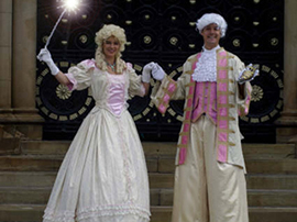 Cinderella and Prince stilt walkers